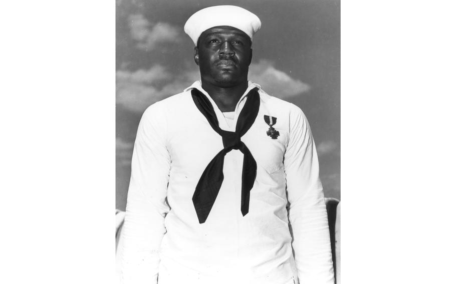 Navy Mess Mate 2nd Class Doris Miller wearing the Navy Cross in 1942.