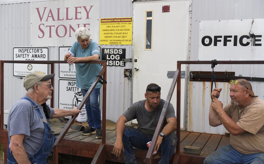 From left, Johnny and Donna Webb, Trent Sewell and Jim Boatright catch up on at the end of their shift at Valley Stone Quarry in Cameron, Okla. Finding enough workers has been a challenge, says co-owner Donna Webb. 