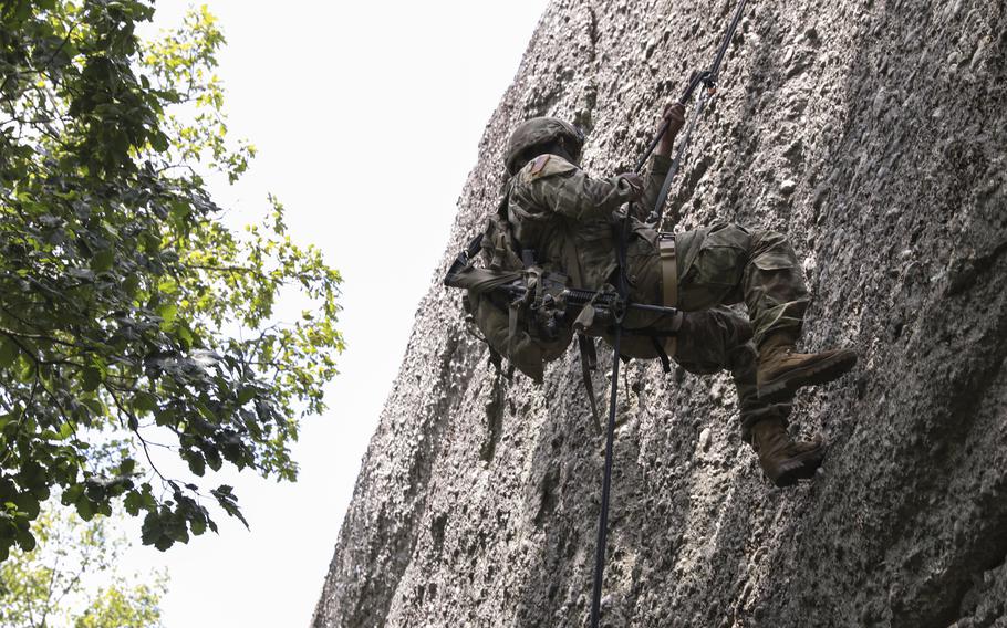 A Pennsylvania Army National Guard soldier rappels down the south face of Boxcar Rocks during training, June 13, 2023.
