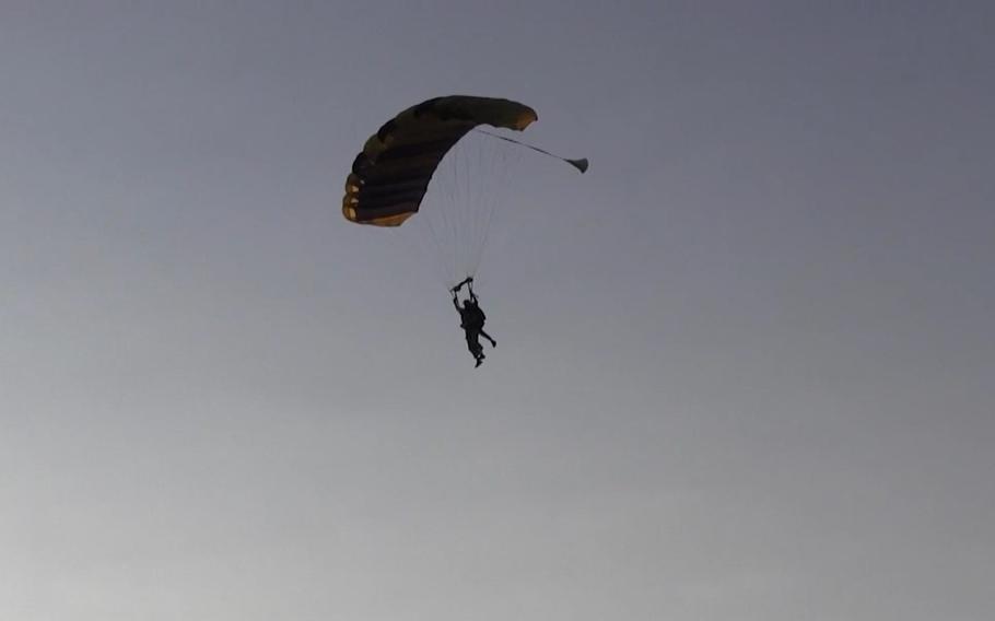 Retired Green Beret and jumpmaster Bob Schneider skydives on July 31, 2021, to celebrate his 90th birthday.