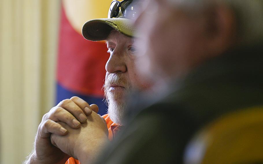 Cokedale Mayor Jason Swetky listens to a town hall meeting on March 20, 2023, in Cokedale, Colorado. A group of residents from Cokedale talked about the implementation bill for Prop 122, which legalized psilocybin mushroom use in Colorado. The residents that attended want to make sure local control is part of the bill. 