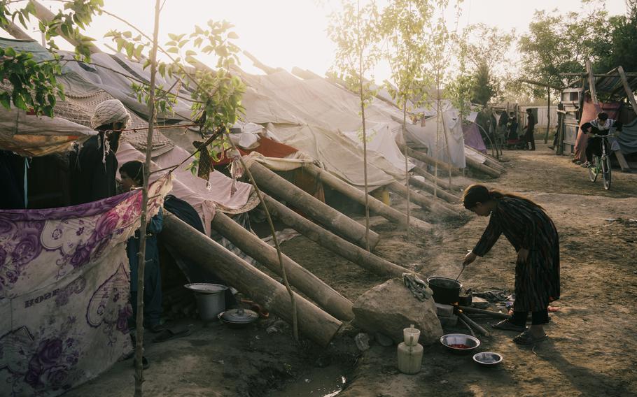 Many of the families displaced in the recent fighting have been forced to live in in a school and in makeshift shelters on the campus in the provincial Afghan capital Kunduz. Photographed in July 2021. 