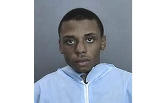 A police mug shot shows Iraq War veteran Frank Moseley