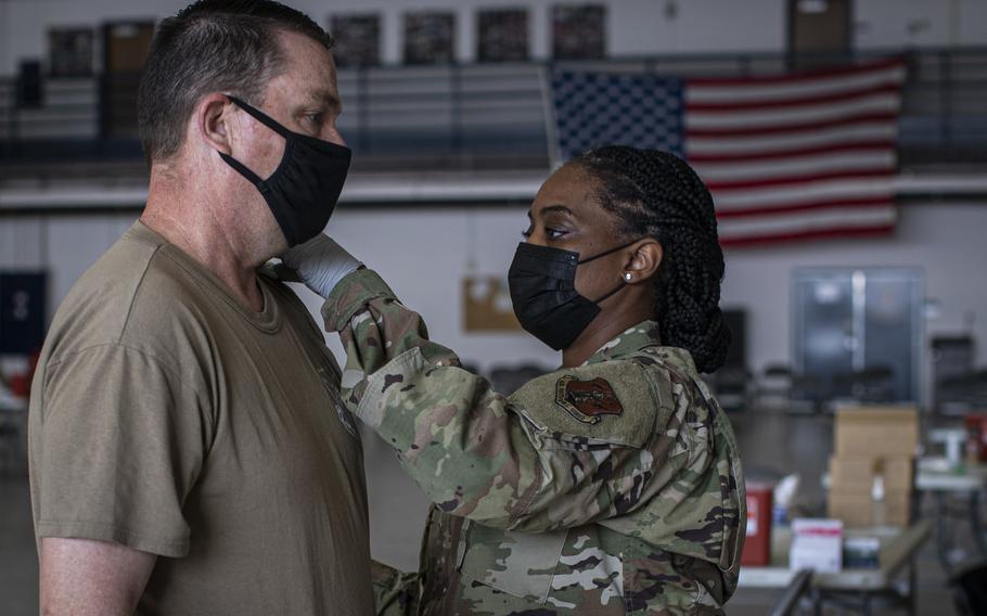 Air Force Brig. Gen. Patrick Kennedy, assistant adjutant general-air and commander of the New Jersey Air National Guard, receives a coronavirus booster shot at the 108th Wing at Joint Base McGuire-Dix-Lakehurst, N.J., on Nov. 6, 2021. 