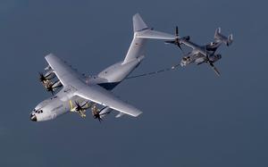 An Airbus A400M from German Air Transport Wing 62 refuels a U.S. Air Force MV-22 B Osprey over northern Germany on March 19, 2025. The U.S. and Germany are among the top five military spenders worldwide, according to the latest annual assessment on global military expenditures by the Stockholm International Peace Research Institute.