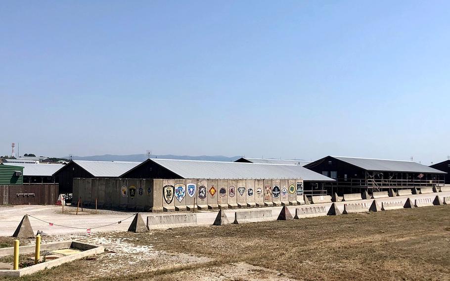 A blast wall with the emblems of units that have rotated through Camp Bondsteel since it was established after a brief NATO bombing campaign in 1999 that ended Serbian rule in the province. The Vermont Army National Guard arrived at the Kosovo base in July for a regular rotation lasting about nine months. Plans call for it to be replaced by a unit from the Virginia National Guard in 2022. 