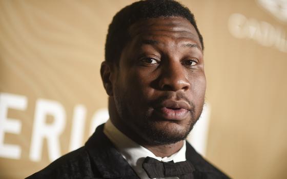 FILE - Jonathan Majors arrives at the American Black Film Festival Honors on March 5, 2023, at 1 Hotel in West Hollywood, Calif. Majors was arrested Saturday, March 25, in New York on charges of strangulation, assault and harassment after a domestic dispute, authorities said. Representatives for Majors said in a statement to The Associated Press that "he has done nothing wrong." (Photo by Richard Shotwell/Invision/AP, File)