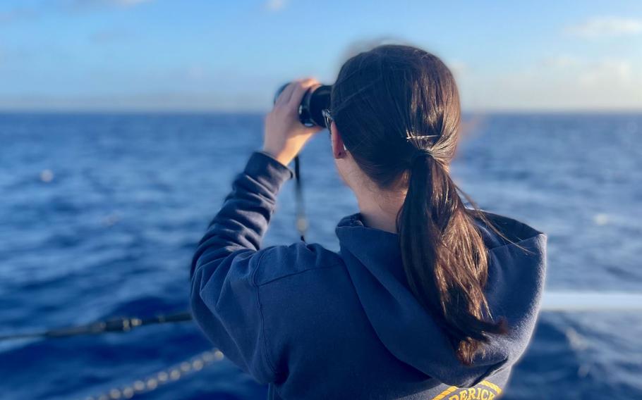 First responders aboard the Coast Guard cutter Frederick Hatch search for a missing scuba diver off Guam's coast, Thursday, Feb. 2, 2023.