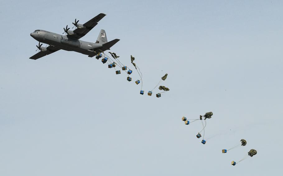 C-130 Hercules aircraft from across Team Little Rock participate in a Capabilities Exercise during the Thunder Over the Rock Air Show at Little Rock Air Force Base, Oct. 21, 2023. Spectators witnessed a mass C-130 formation aerial resupply with four heavy equipment simulation loads from the 189th Airlift Wing and 40 bundles dropped from the 314th AW demonstrating the container delivery system. 