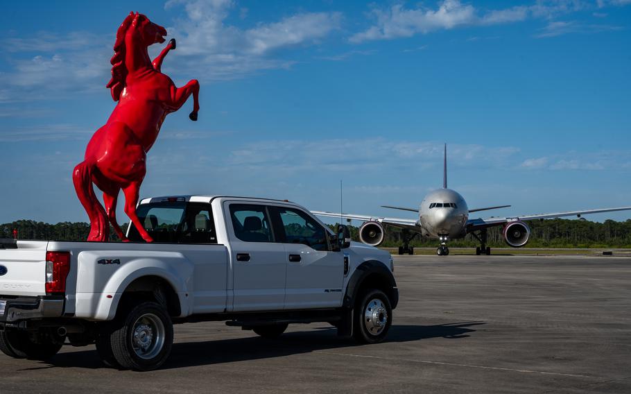 A U.S. Air Force 823rd Rapid Engineer Deployable Heavy Operational Repair Squadron Engineer statue sits on a pickup truck at Hurlburt Field, Fla., Sunday, April 14, 2024. 