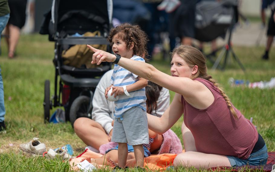 Raul and Lindsay Mercado watch the Tora! Tora! Tora! performance during The Great Texas Airshow at Joint Base San Antonio-Randolph, Saturday, April 6, 2024.