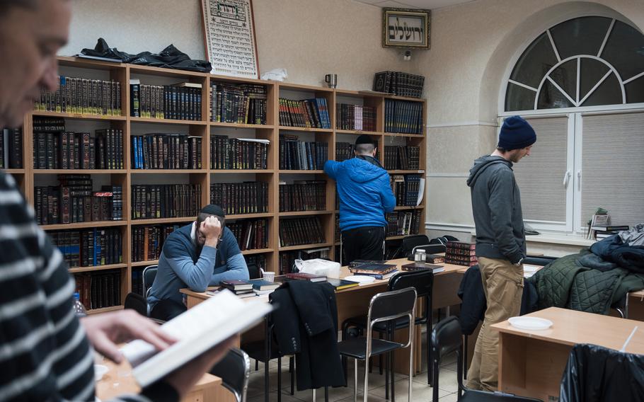 Jewish community members pray during sabbaths at a synagogue in Kyiv, Ukraine, on Dec. 10, 2022. 