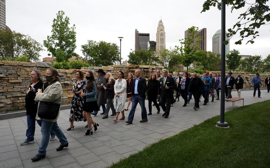 The National Veterans Memorial and Museum Gold Star Family Vigil was held at the museum on Friday, May 28, 2021. A procession of Gold Star families walks from the museum to the Memorial Grove during the ceremony.