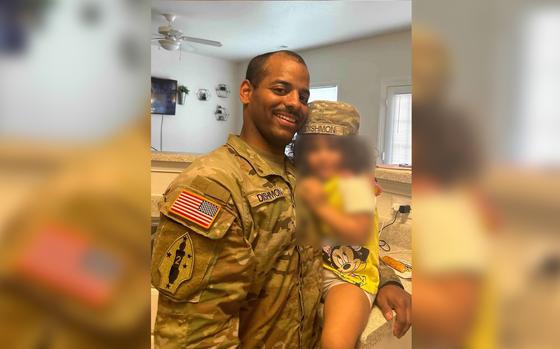 Spc. Austin Dishmon, a soldier with the 3rd Infantry Division shown here in an undated family photo, died March 27, 2024 while deployed to Lithuania. The Army hasn’t released the circumstances of his death. The face of Dishmon's daughter has been blurred at the request of his wife.