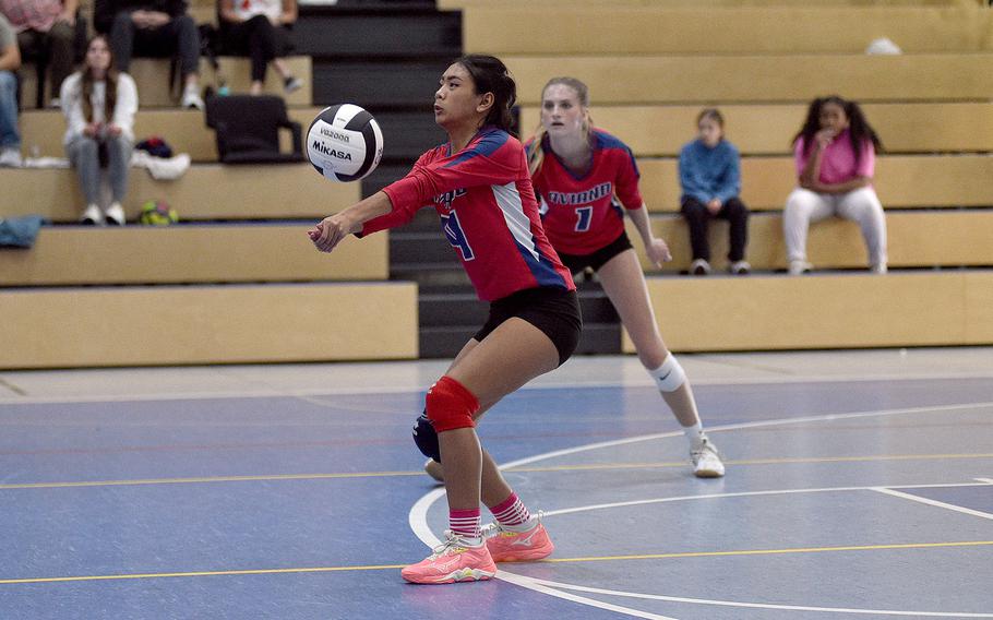 Aviano's Nevaeh Zamora bumps the ball during the Saints' Division II semifinal match against Vicenza at the DODEA European volleyball championships on Oct. 27, 2023, at Ramstein High School on Ramstein Air Base, Germany.