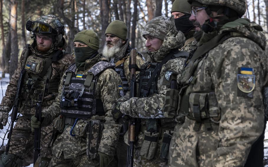 Service members participate in the training exercise.