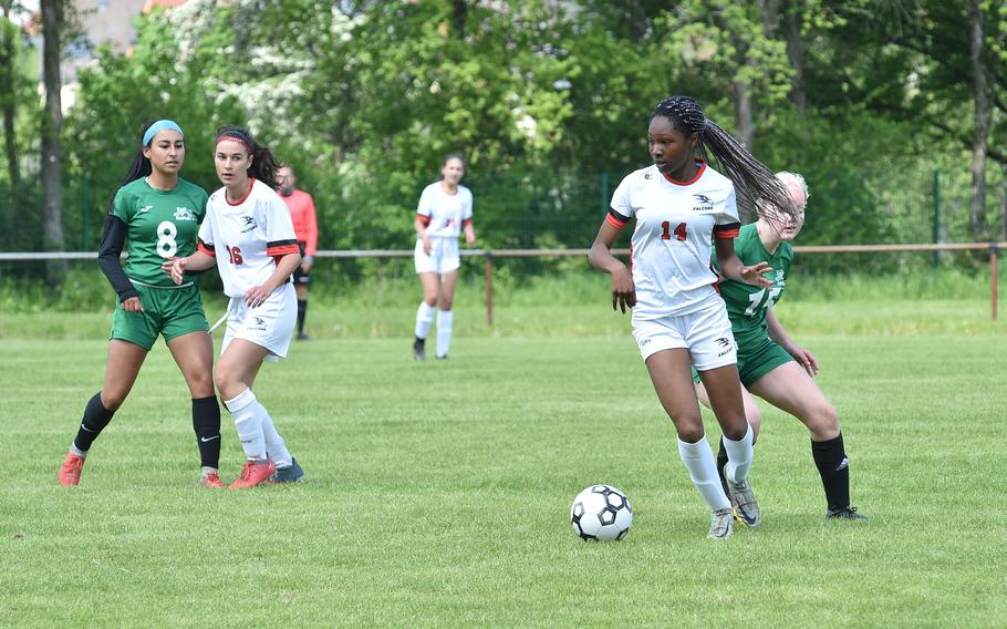 American Overseas School of Rome winger Gabby Nespoli looks ahead after getting around Naples defender Rylee Rummel, right, during a Division II semifinal at the DODEA European soccer championships on May 17, 2023, at VfR Baumholder's stadium in Baumholder, Germany.