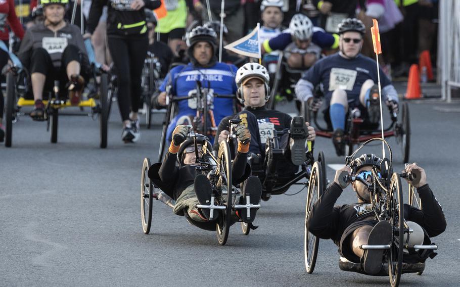 Wheelchair competitors start the Army 10-Miler on Sunday, Oct. 9, 2022, at the Pentagon.
