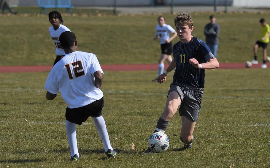 Dancing past defenders, Ansbach’s Benjamin Schuck shows off his footwork during a match against Baumholder on Saturday, March 18, 2023. 