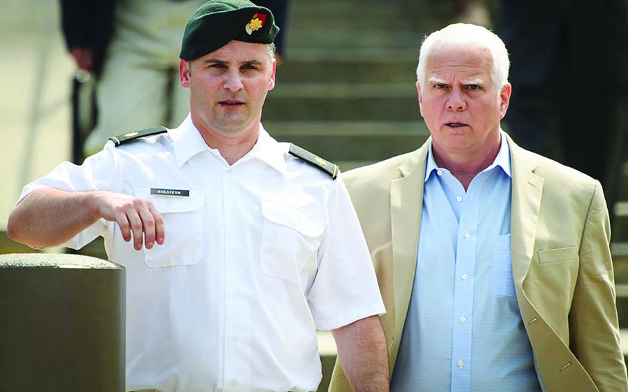  50p na              Maj. Mathew Golsteyn leaves the Fort Bragg courtroom facility with his civilian lawyer, Phillip Stackhouse, right, after a hearing on Thursday, June 27, 2019.