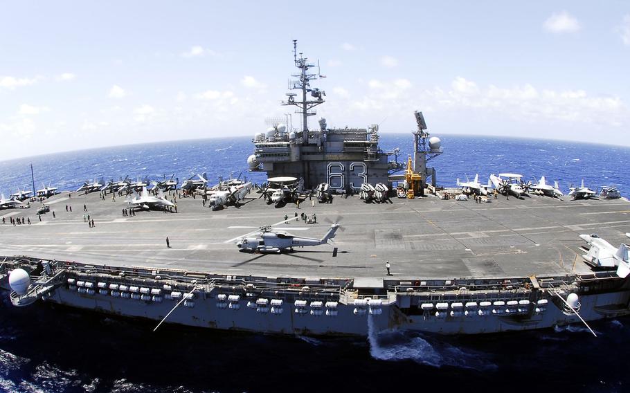 The aircraft carrier USS Kitty Hawk steams near Hawaii during Rim of the Pacific drills, July 24, 2008. 