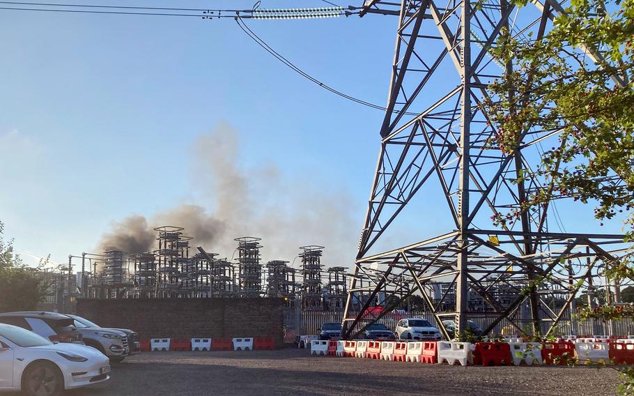 Smoke from a large fire at the National Grid's IFA interconnector site in Sellindge, U.K., is seen on Sept. 15, 2021. 