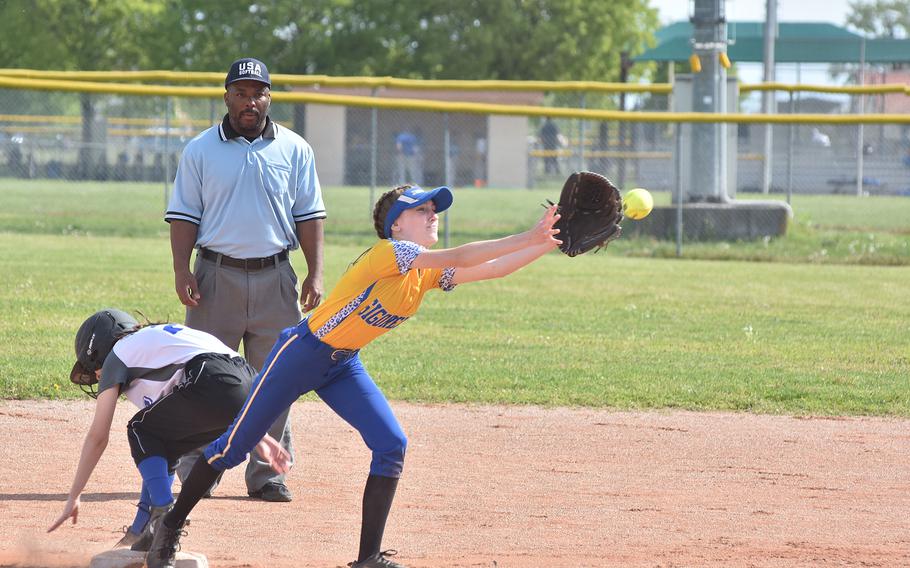 Hohenfels' Erin Arigulo beats the throw to second Saturday, April 30, 2022, before Sigonella's Jaelynne Rosler can come up with the ball.