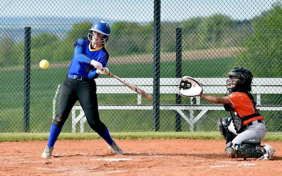 Sigonella's Briar Love takes a crack at a pitch during an April 27, 2024, game against Spangdahlem at Spangdahlem High School in Spangdahlem, Germany.