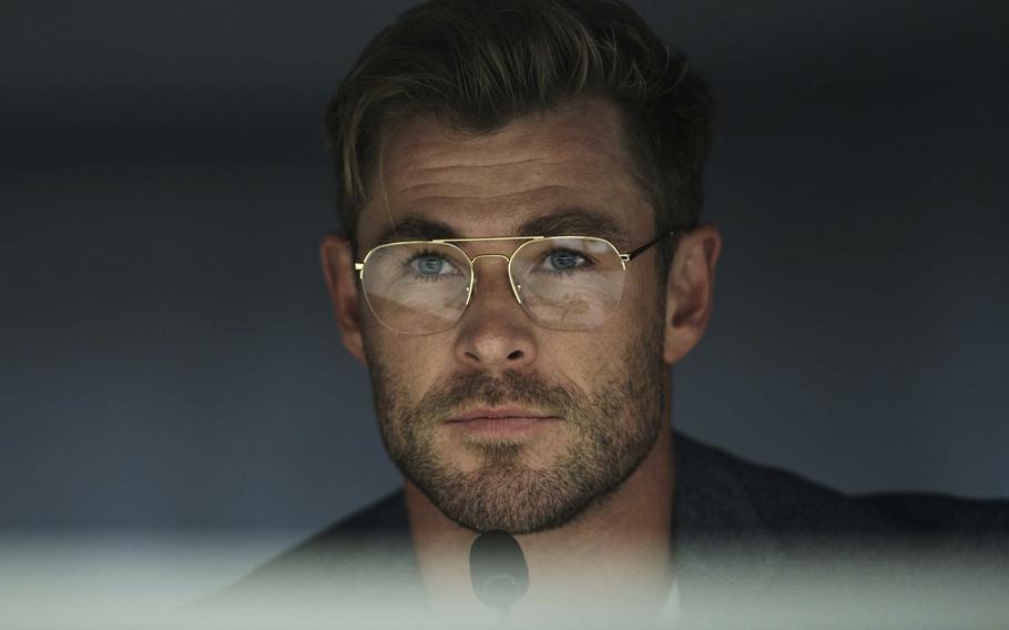 Chris Hemsworth plays Dr.  Steve Abnesti in a scene from “Spiderhead.” 