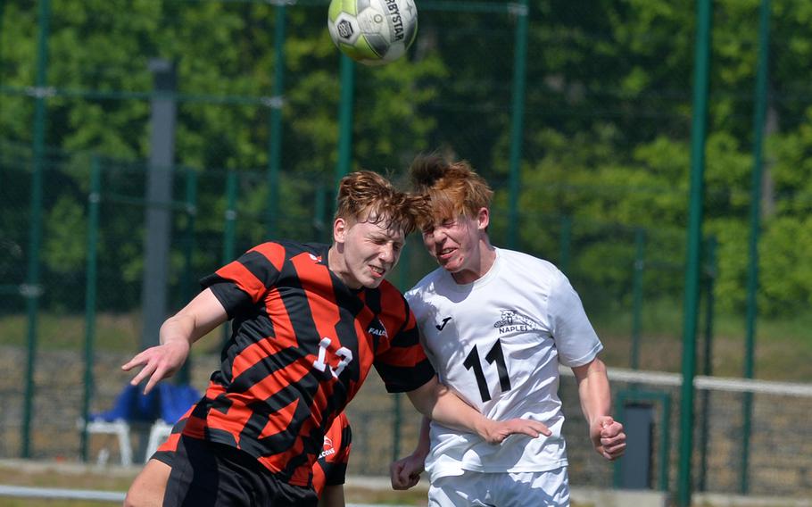AOSR’s Seamus Burges-Sims, left, and Naples’ Camden Kasparek go head to head for the ball in the Division II boys final at the DODEA-Europe soccer championships in Ramstein, Germany, May 18, 2023. AOSR beat Naples 5-1in an all-Italy final.