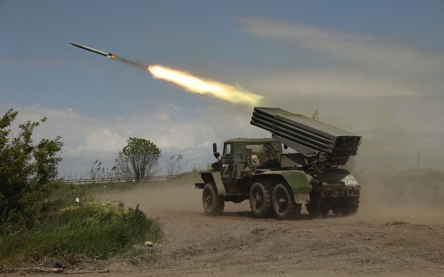 A Donetsk People's Republic militia's multiple rocket launcher fires from its position not far from Panteleimonivka, in territory under the government of the Donetsk People's Republic, eastern Ukraine, Saturday, May 28, 2022. 
