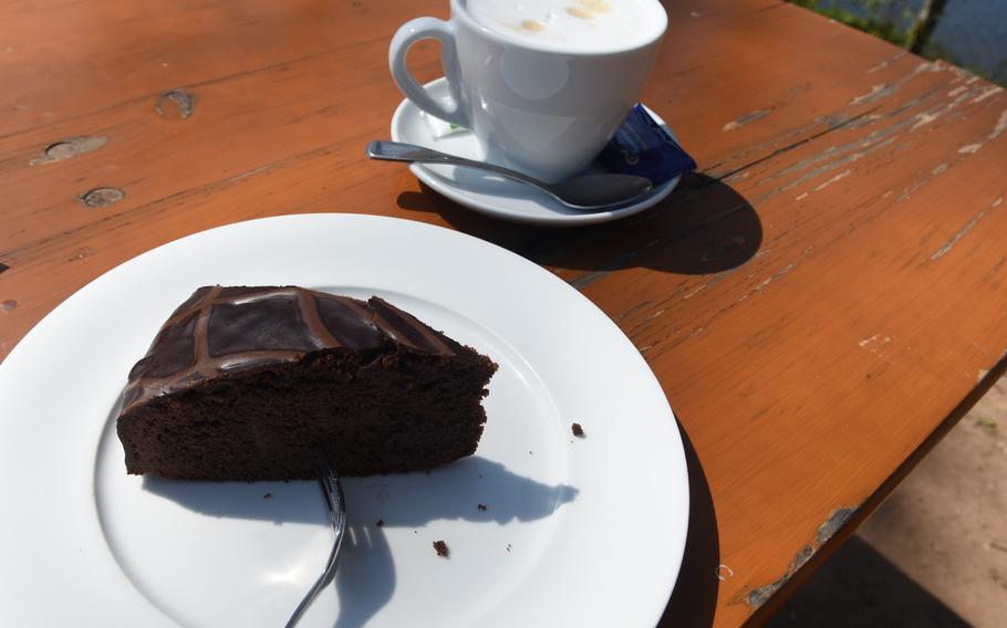 This slice of chocolate cake goes well with a cappuccino at the Peters Alm beer garden in Homburg, Germany, April 19, 2022.