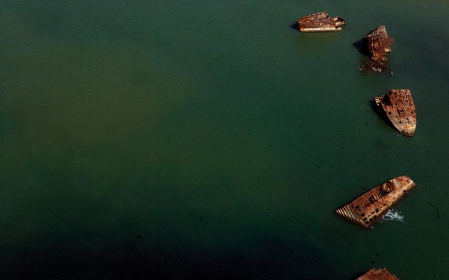 Volcanic activity beneath Iwo Jima, site of a defining World War II battle between American and Japanese forces, is pushing sunken naval vessels to the surface.