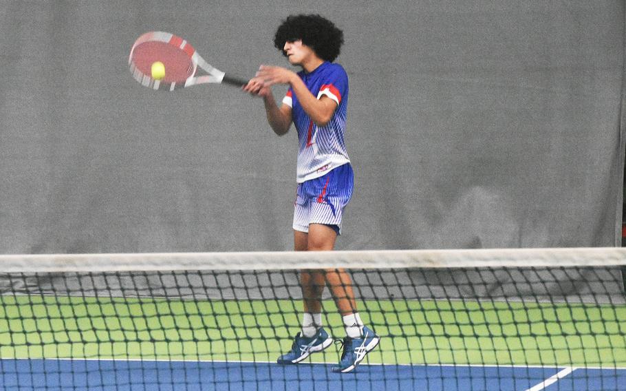 Ramstein's Robert Cotto uses a forehand to win a point during the DODEA-Europe tennis championships boys doubles finals held Saturday, Oct. 23, 2021.