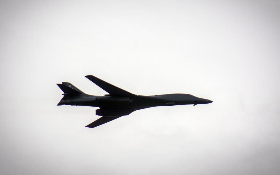 An Air Force B-1B Lancer flies over Seoul.