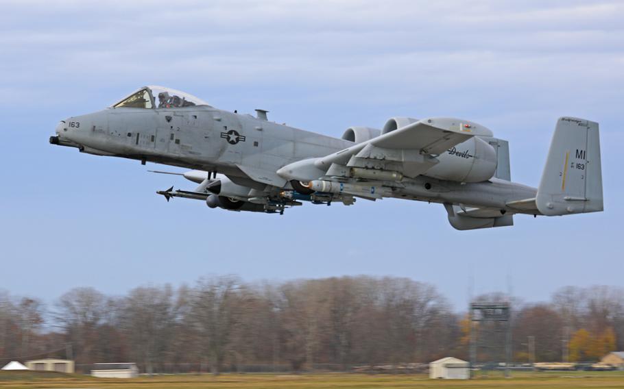 An A-10 Thunderbolt II aircraft assigned to the 107th Fighter Squadron, at Selfridge Air National Guard Base, Mich., passes above the flight-line following a training mission during the November drill, Saturday, Nov. 5, 2022.