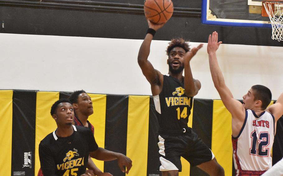 Vicenza's Tyler Suber puts up a shot against Aviano on Thursday, March 3, 2022, at the DODEA-Europe Division II basketball championships.