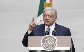 FILE - Mexico's President Andres Manuel Lopez Obrador speaks during a rally marking his fifth anniversary in office, at the Zocalo in Mexico City on July 1, 2023. Mexico’s armed forces sent troops, vehicle convoys and helicopters into remote towns near the southern border with Guatemala on Wednesday, Sept. 27, after drug cartels blocked roads and cut off electricity in some areas over the weekend. Lopez Obrador acknowledged Monday that the cartels have cut off electricity in some towns and forbidden government workers from coming in to the largely rural area to fix the power lines. (AP Photo/Aurea Del Rosario, File)