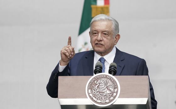FILE - Mexico's President Andres Manuel Lopez Obrador speaks during a rally marking his fifth anniversary in office, at the Zocalo in Mexico City on July 1, 2023. Mexico’s armed forces sent troops, vehicle convoys and helicopters into remote towns near the southern border with Guatemala on Wednesday, Sept. 27, after drug cartels blocked roads and cut off electricity in some areas over the weekend. Lopez Obrador acknowledged Monday that the cartels have cut off electricity in some towns and forbidden government workers from coming in to the largely rural area to fix the power lines. (AP Photo/Aurea Del Rosario, File)
