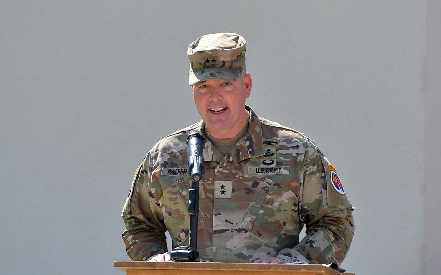 Maj. Gen. John Rafferty speaks at a podium.