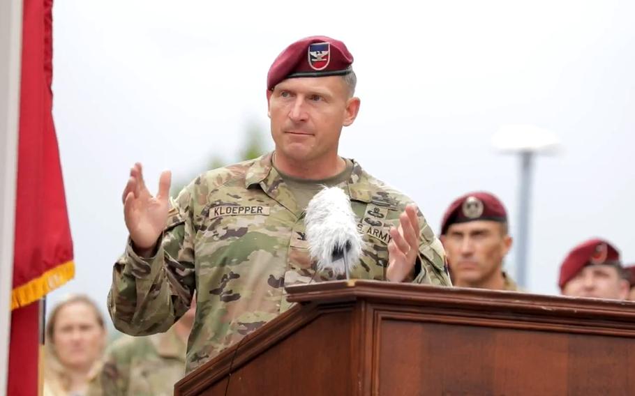 The outgoing commander of the 173rd Airborne Brigade, Col. Michael Kloepper, speaks at the change of command ceremony in Vicenza, Italy, on July 6, 2023. Kloepper handed over command to Col. Joshua Gaspard.