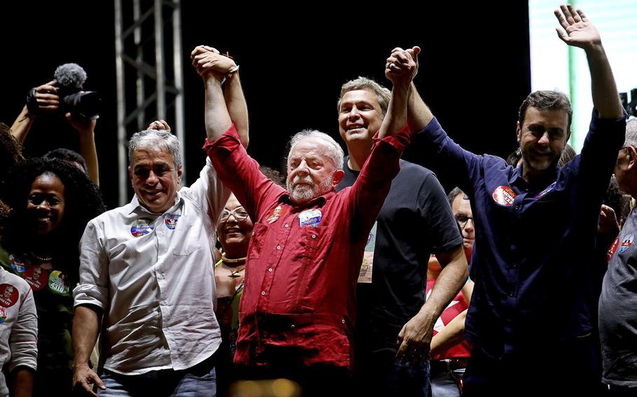 Presidential candidate and former president of Brazil, Luiz Inacio Lula da Silva, center, attends a campaign rally in the Rio de Janeiro metropolitan area on Sept. 8, 2022 in Nova Iguacu, Brazil. 