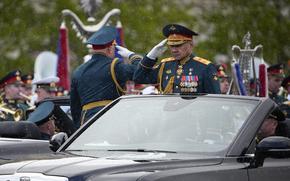 Russian Defense Minister Sergei Shoigu is driven along Red Square in an Aurus car during the Victory Day military parade in Moscow, Russia, Thursday, May 9, 2024, marking the 79th anniversary of the end of World War II. (AP Photo/Alexander Zemlianichenko)