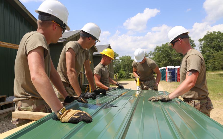 Soldiers with the Army Reserve’s 389th Engineer Company of Des Moines, Iowa, work on a troop project June 21, 2022, at Camp Courage on South Post at Fort McCoy, Wis. Members of the unit on Sunday, Nov. 13, 2022, helped construct a new dugout at Davenport, Iowa’s Northwest Park.