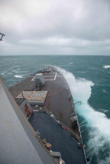 The Arleigh Burke-class guided-missile destroyer USS Chung-Hoon sails through the Taiwan Strait on Jan. 5, 2022. Chung-Hoon, part of the Nimitz Carrier Strike Group, is underway in 7th Fleet conducting routine operations. 7th Fleet is the U.S. Navy’s largest forward-deployed numbered fleet, and routinely interacts and operates with 35 maritime nations in preserving a free and open Indo-Pacific region.