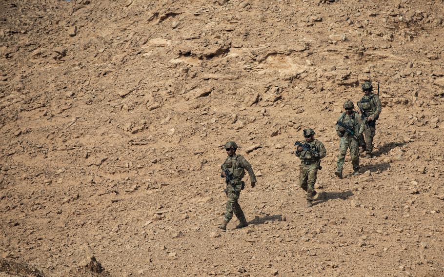 U.S. soldiers patrol at Al Asad Air Base in Iraq on Nov. 18, 2022. About 2,500 U.S. troops continue to assist in the fight against ISIS despite the formal end of the U.S. combat mission in Iraq in 2021.