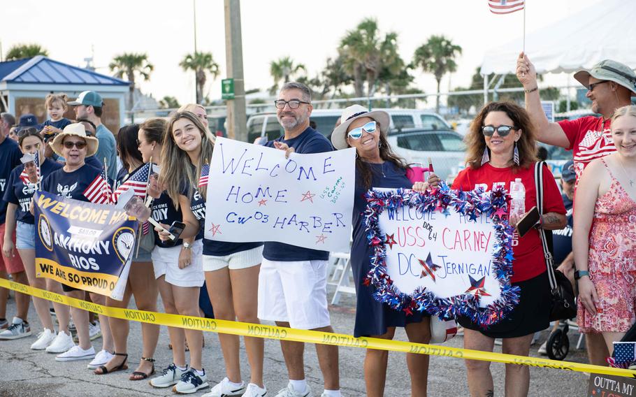 Family and friends of sailors assigned to USS Carney (DDG 64) prepare to reunite with their loved ones during the ship’s homecoming at on Sunday, May 19, 2024, Naval Station Mayport, Fla.