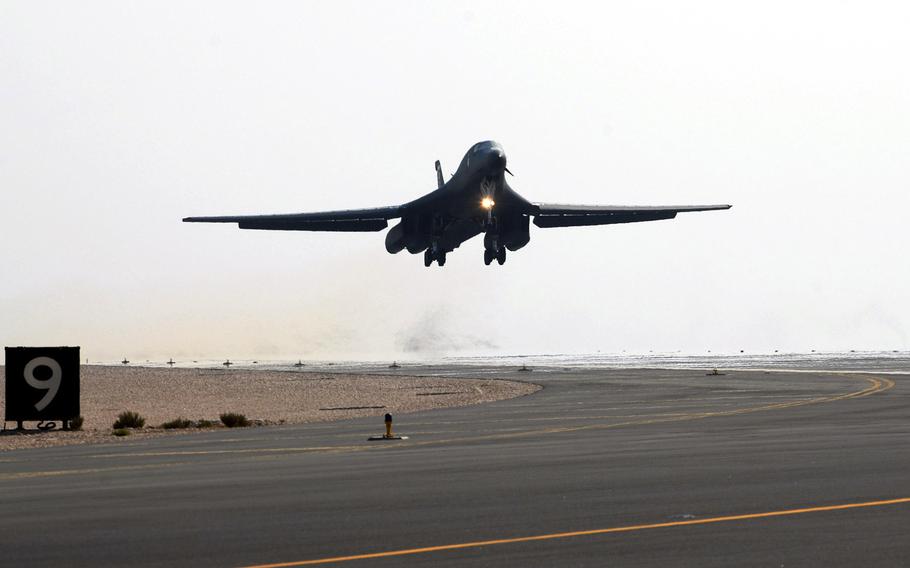 An Air Force B-1B Lancer takes off from a runway in Southwest Asia for a mission in support of Operation Enduring Freedom. University of Oklahoma engineering students Tristen Portis and Rick Lucio worked with their adviser, Kuang-Hua Chang, Williams Companies Foundation presidential professor in the School of Aerospace and Mechanical Engineering, to fix a low rudder of a B-1B aircraft.