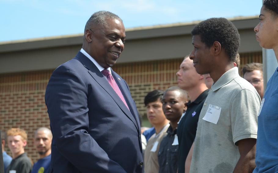 Defense Secretary Lloyd Austin speaks to 85 military recruits before they are officially sworn into the service on Wednesday, July 5, 2023, at Fort Meade, Md. 