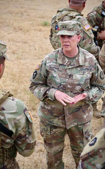 Maj. Gen. Tracy Norris seen during a visit to troops serving along the Texas border with Mexico in October 2021. She became adjutant general of the Texas Military Department in January 2019. Norris has led troops through one of the state’s largest, longest and most controversial missions. Gov. Greg Abbott announced Monday that Maj. Gen. Thomas Suelzer will replace her.